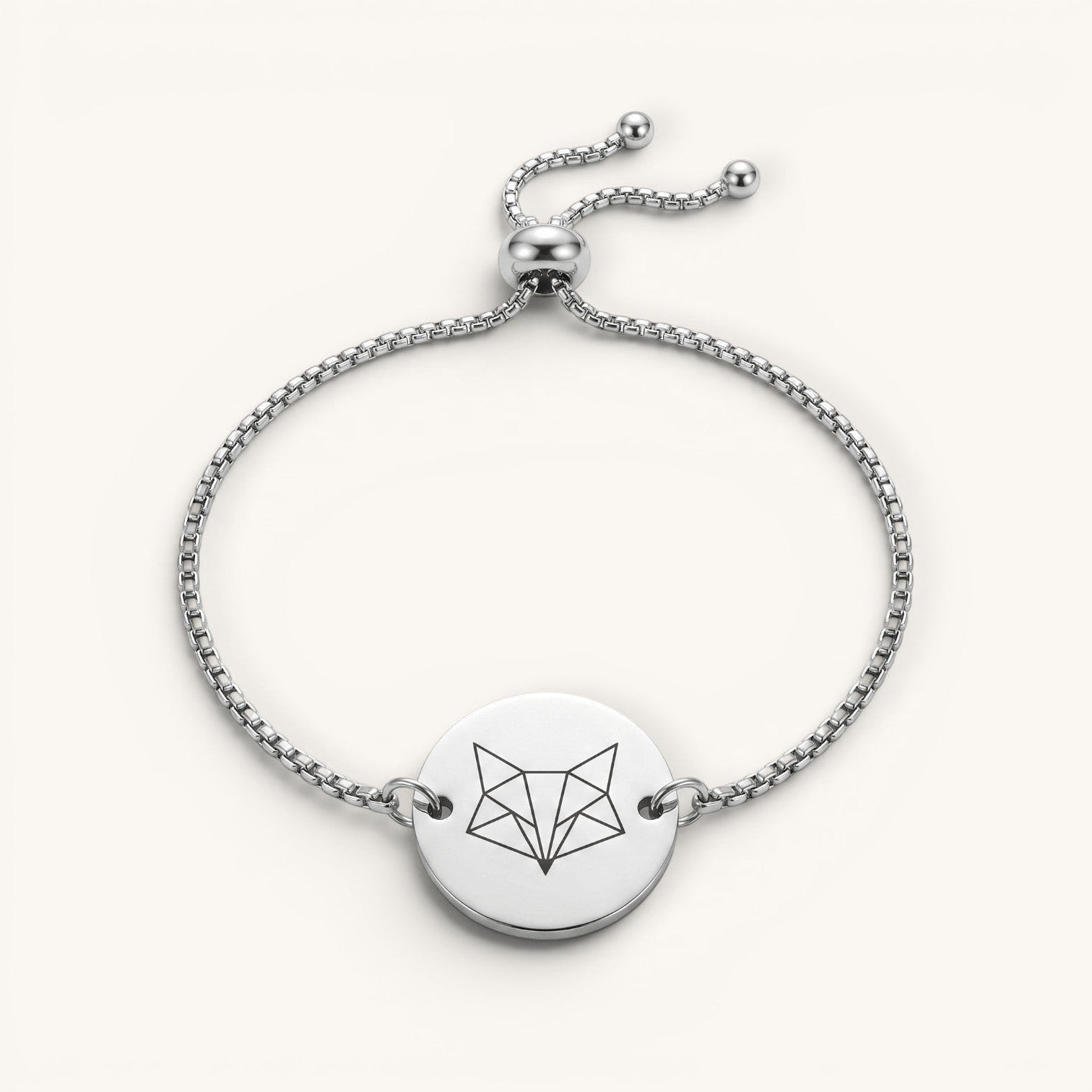 Pulsera Aura Moment de acero inoxidable ajustable con medalla redonda grabada con diseño geométrico de zorro