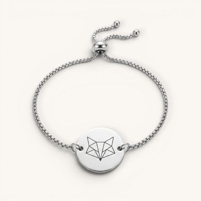 Pulsera Aura Moment de acero inoxidable ajustable con medalla redonda grabada con diseño geométrico de zorro