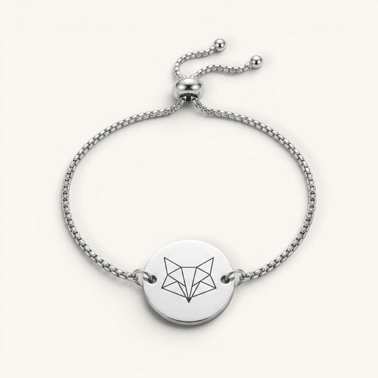 Pulsera Aura Moment de acero inoxidable ajustable con medalla redonda grabada con diseño geométrico de zorro